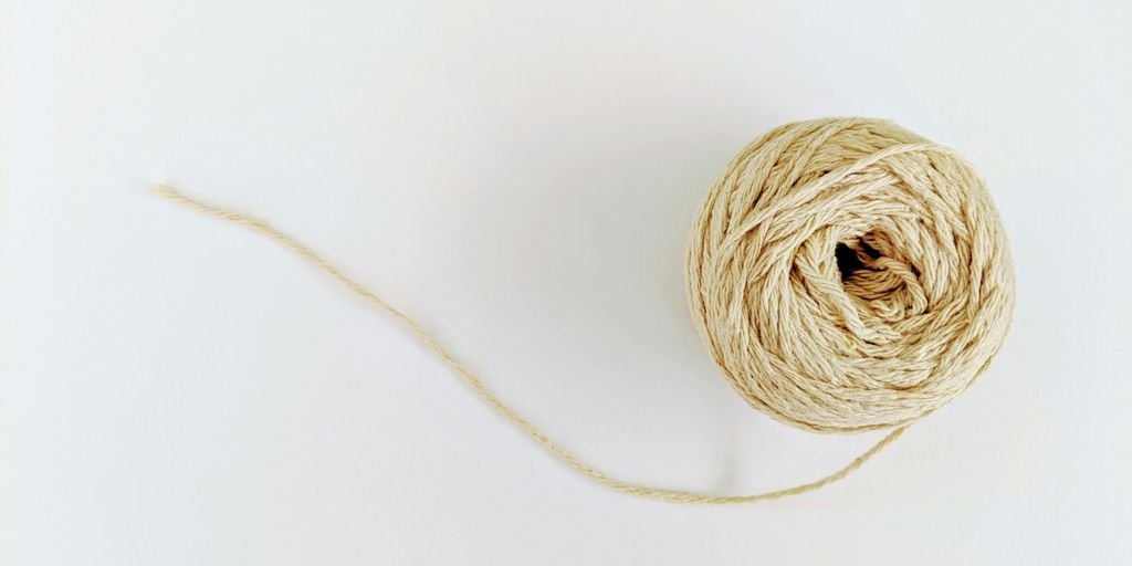 white yarn on white surface